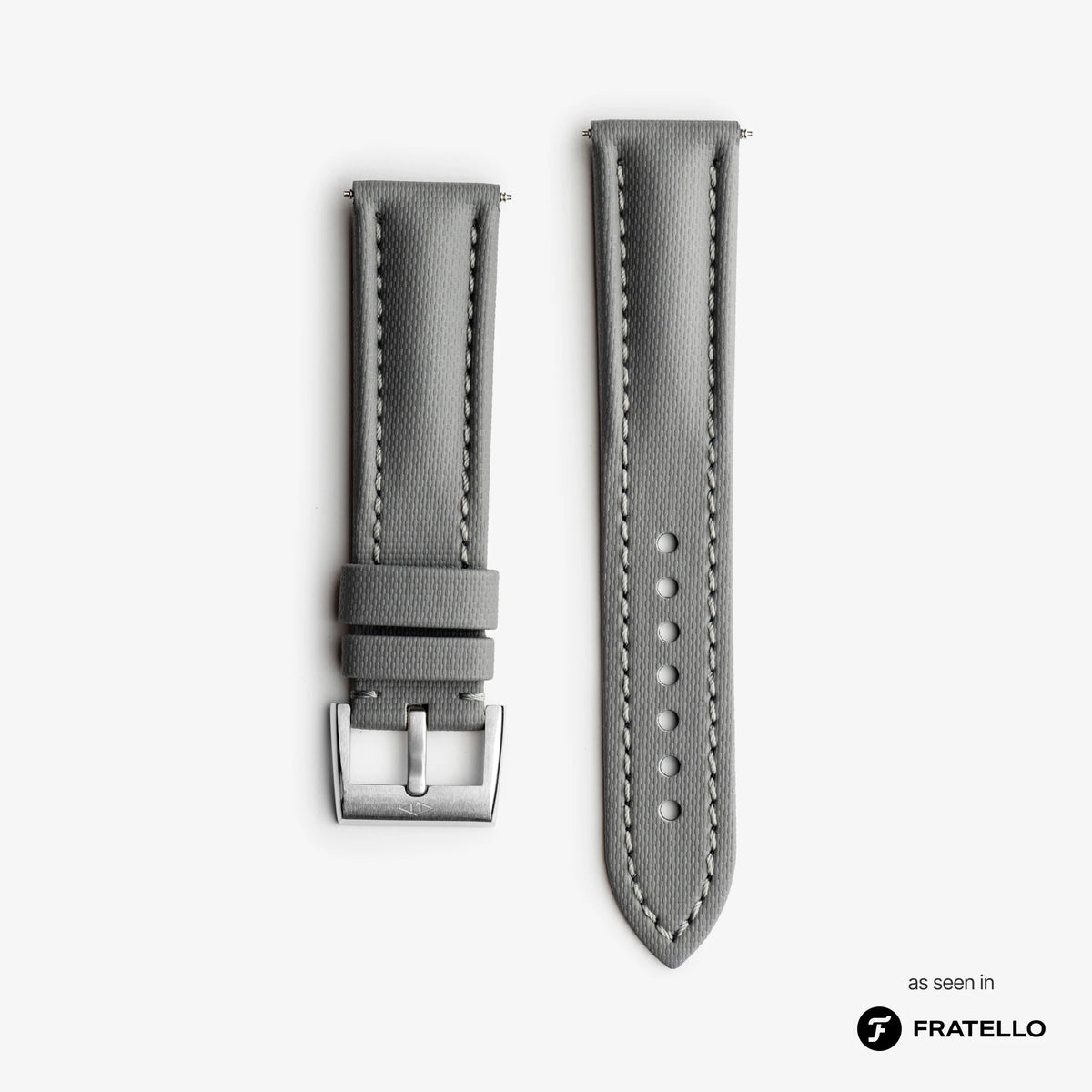 Gray watch strap with silver buckle on a white background, branded 'Fratello'.