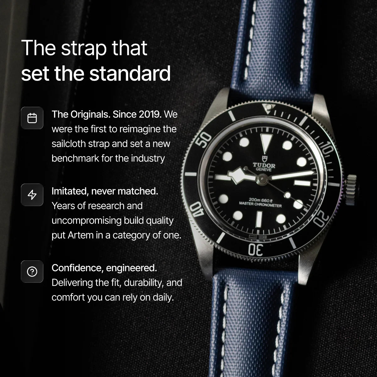 Tudor watch with blue strap and black dial on a dark background