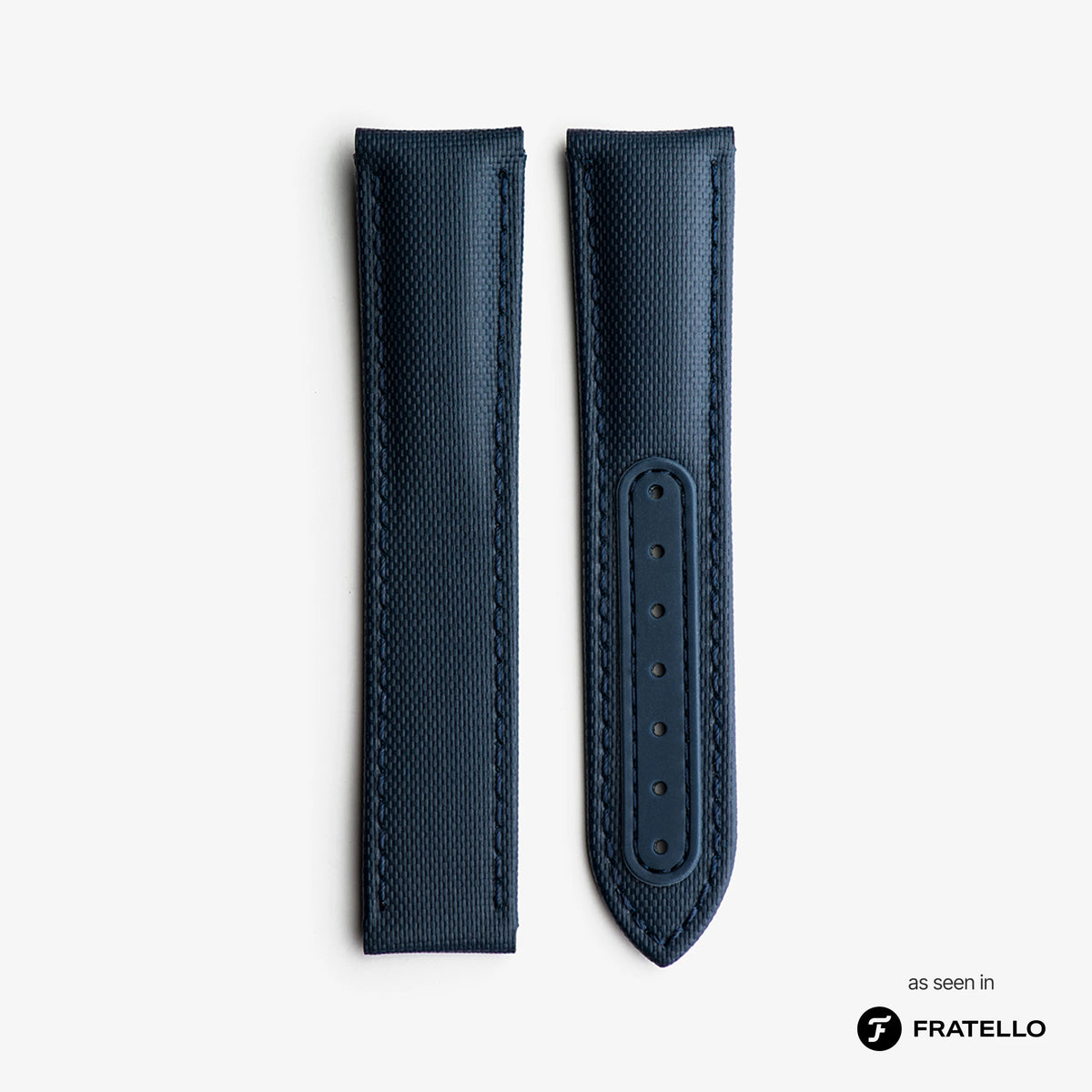 Blue leather watch strap on a light gray background with 'Fratello' branding.