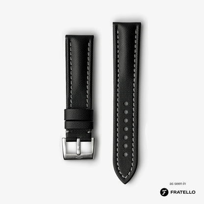 Black watch strap with silver buckle on a light gray background, branded 'Fratello'.