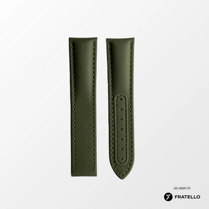 Green leather watch strap on a light gray background with 'Fratello' branding.