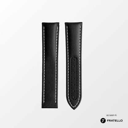 Black leather watch strap with white stitching on a light gray background, featuring the Fratello brand.