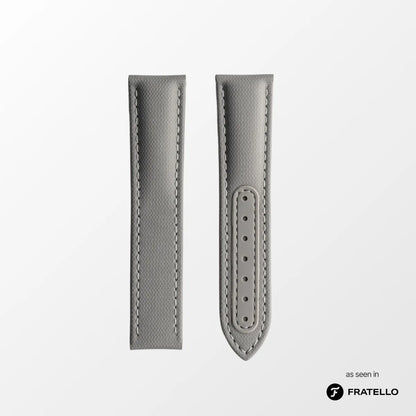 Gray watch strap with stitching detail on a white background, branded 'Fratello'.