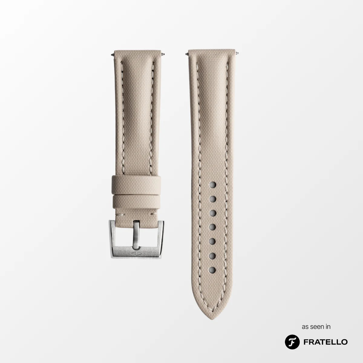 Beige watch strap with silver buckle on a white background, branded 'Fratello'.