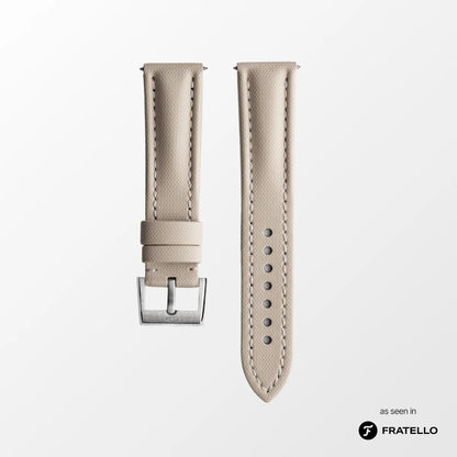 Beige watch strap with silver buckle on a white background, branded 'Fratello'.
