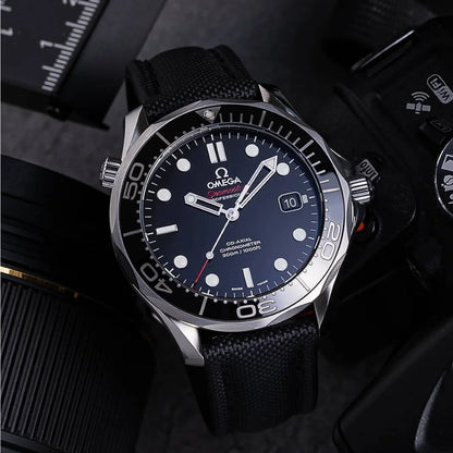 Omega watch with black strap and blue dial on a dark background