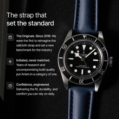Tudor watch with blue strap on a black background