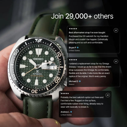 Seiko watch with green strap held in hand, reviews displayed on screen