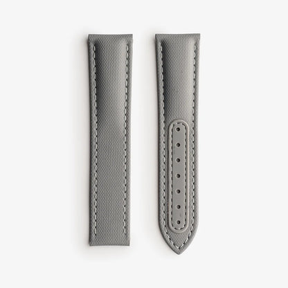 Gray watch strap with stitching detail on a white background, branded 'Fratello'.