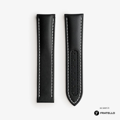 Black leather watch strap with white stitching on a light gray background, featuring the Fratello brand.