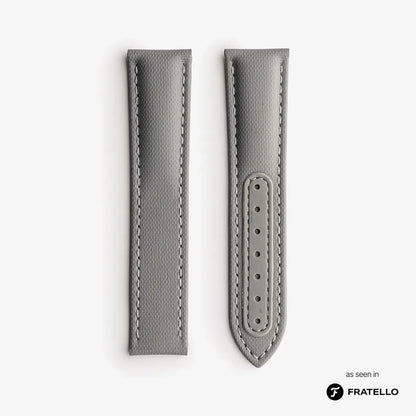 Gray watch strap with stitching detail on a white background, branded 'Fratello'.
