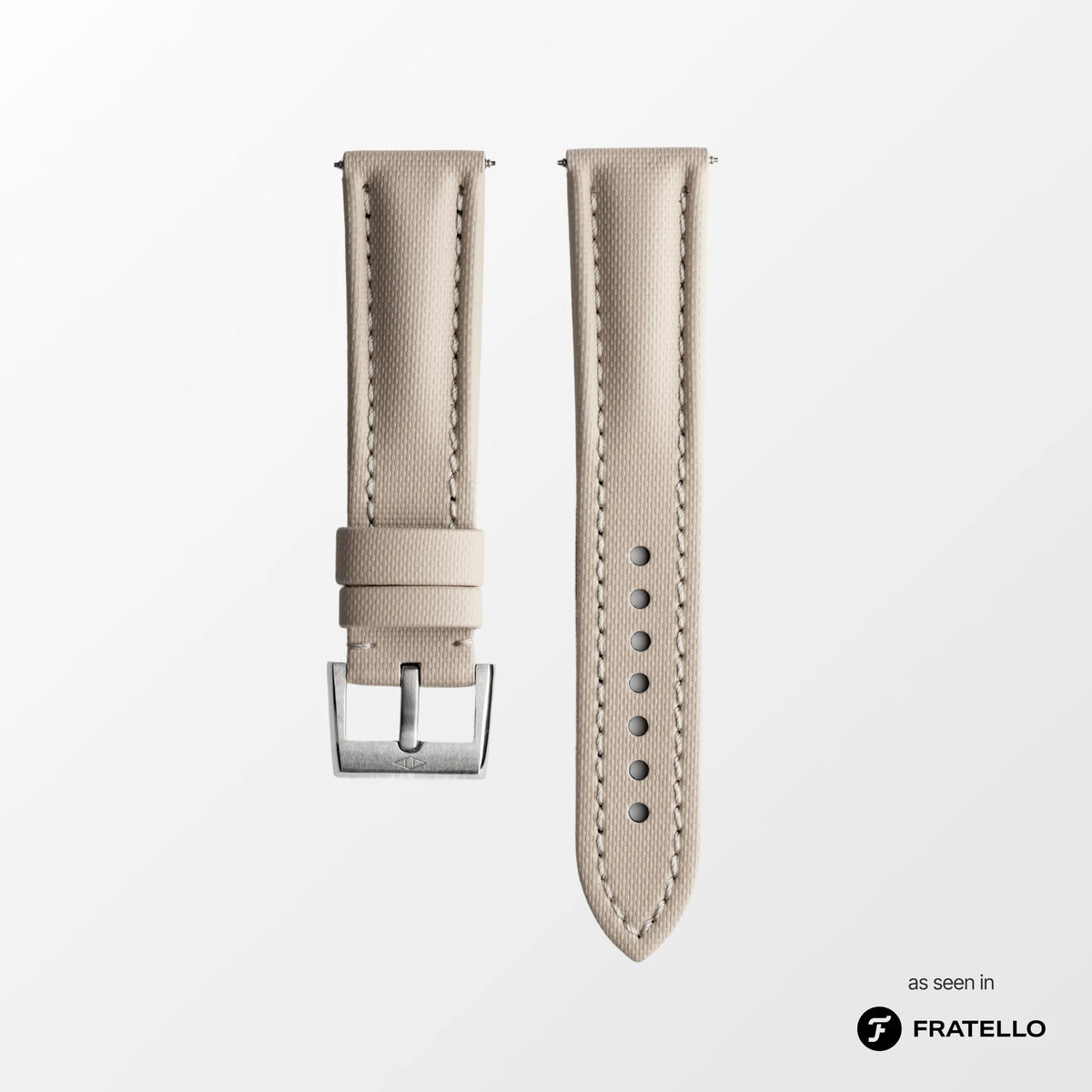 Beige watch strap with silver buckle on a white background, branded 'Fratello'.