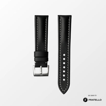Black watch strap with silver buckle on a light gray background, branded 'Fratello'.