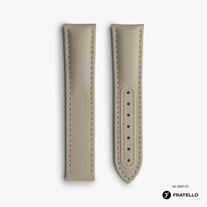 Beige watch strap on a white background with Fratello branding.