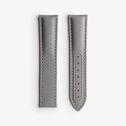 Gray watch strap with stitching detail on a white background, branded 'Fratello'.